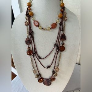 Group of 5 neutral tone beige and brown necklaces